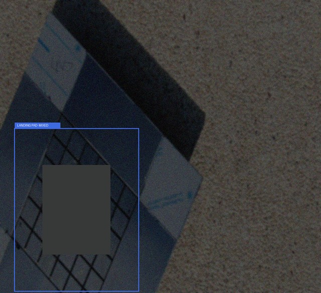Published KIOS example under mixed camera stress, with source annotation visible